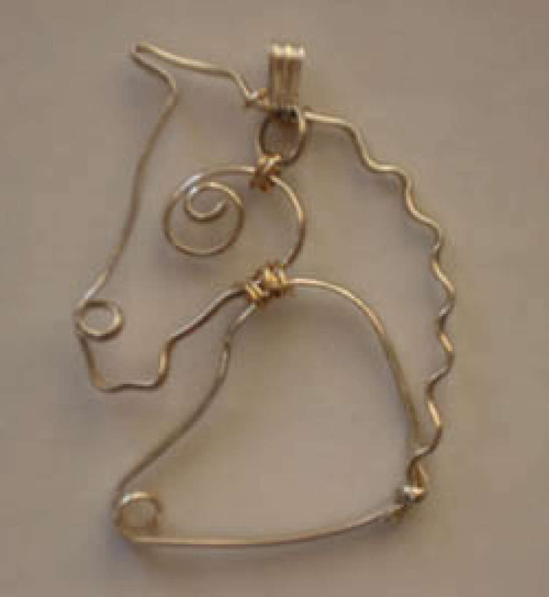 Horse head pendant